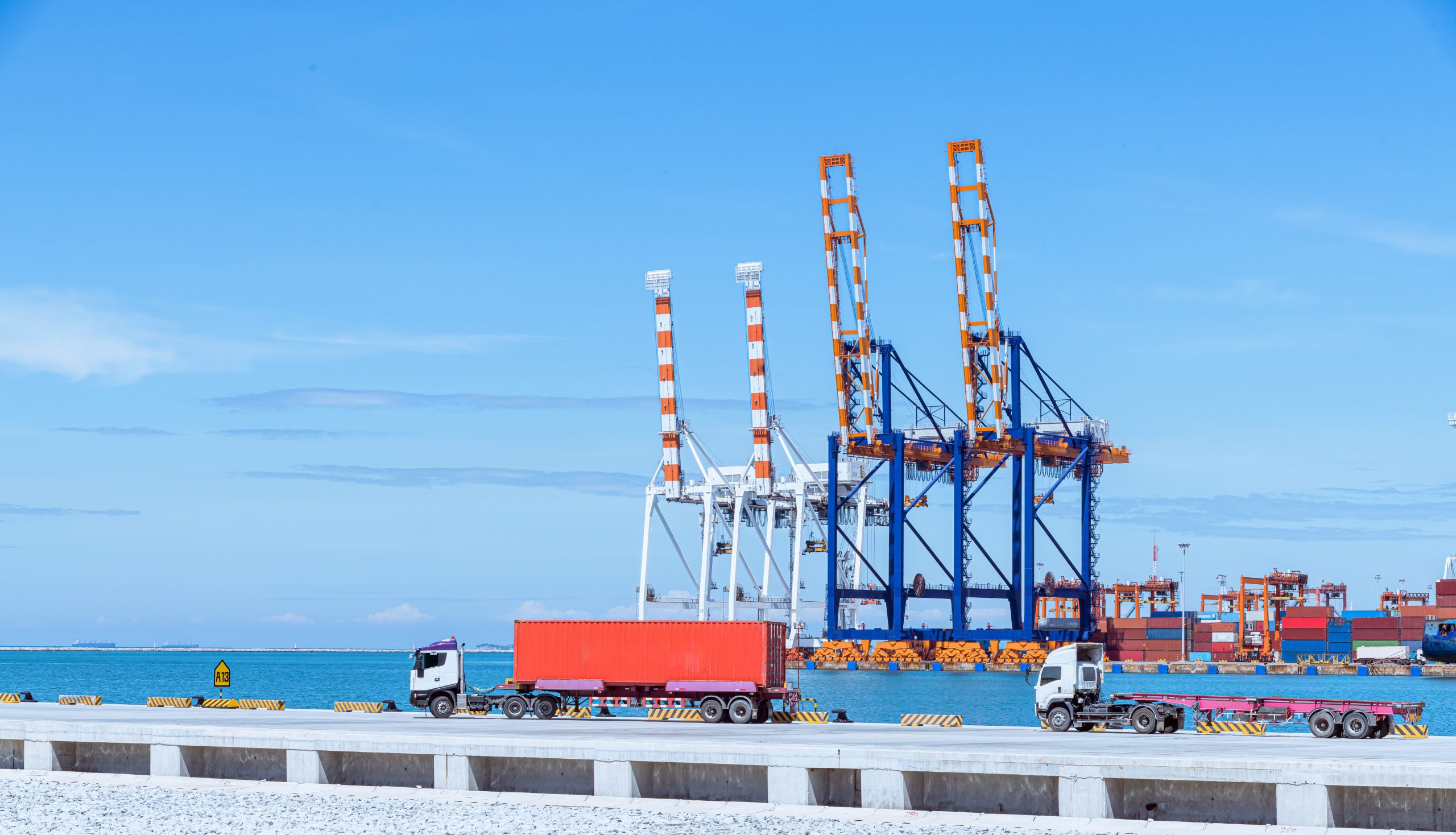 cargo-ship-and-truck-at-seaport-waiting-for-contai-2025-03-15-02-02-57-utc
