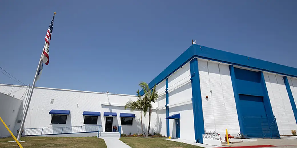 CIE Factory exterior with American flag